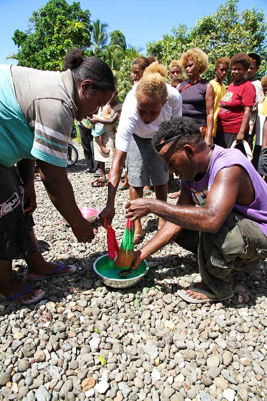 Teaching how to dye the fabrics correctly for getting the right pattern.